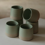 Kaloka x Kafe de Flores 2 Tones Series A handmade ceramic cup in aqua glass, artisanal stoneware Indonesia