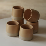 Kaloka x Kafe de Flores 2 Tones Series A handmade ceramic cup in latte, artisanal stoneware Indonesia