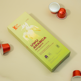 UWU Arabica coffee capsule flat lay with cherries, Kafe de Flores Manggarai Flores Indonesia