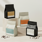 Kafe de Flores four specialty coffee products flat lay, Manggarai Flores Indonesia
